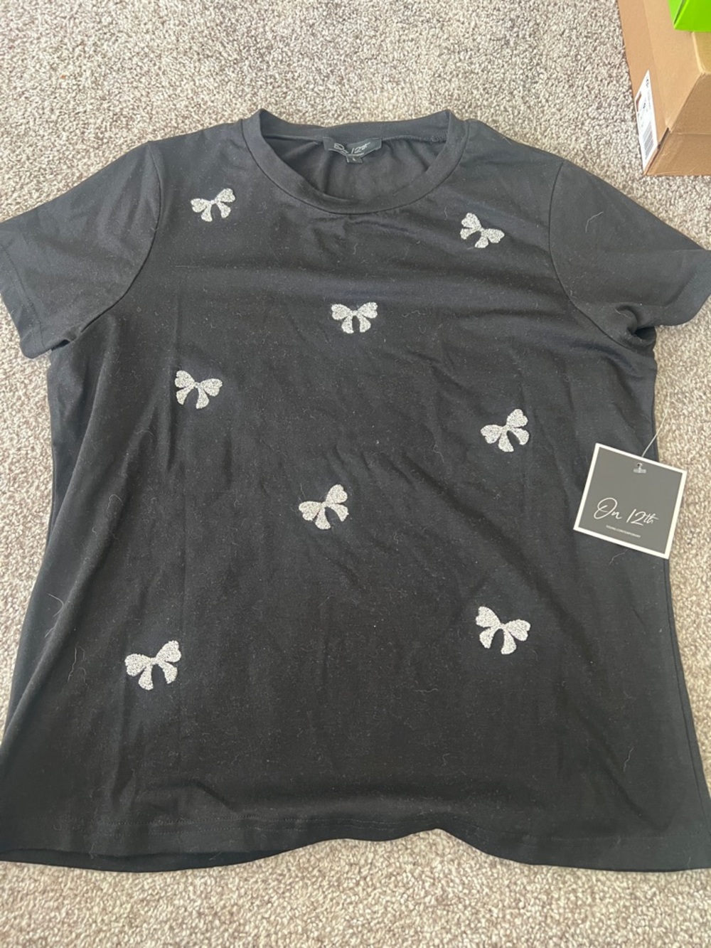 On 12th Black Tee with Silver Glitter Bows